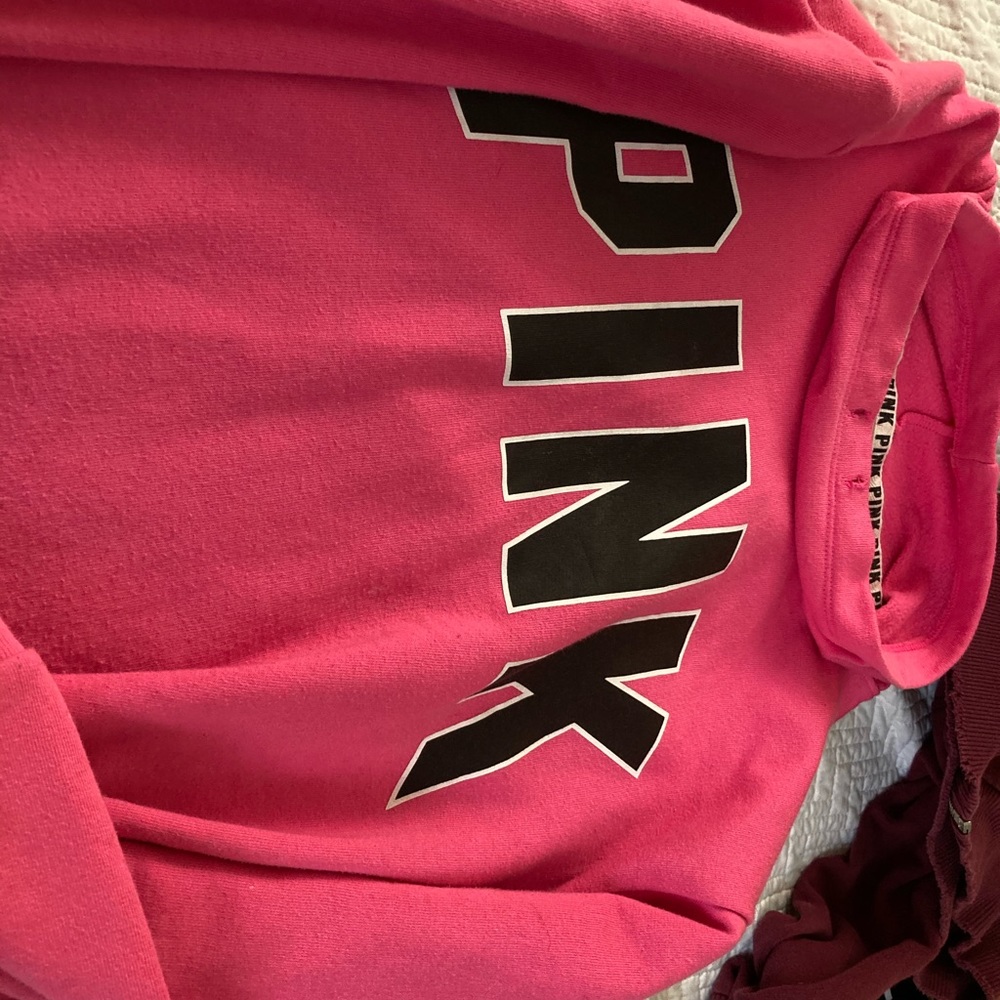 A pink hoodie with no hoodie
